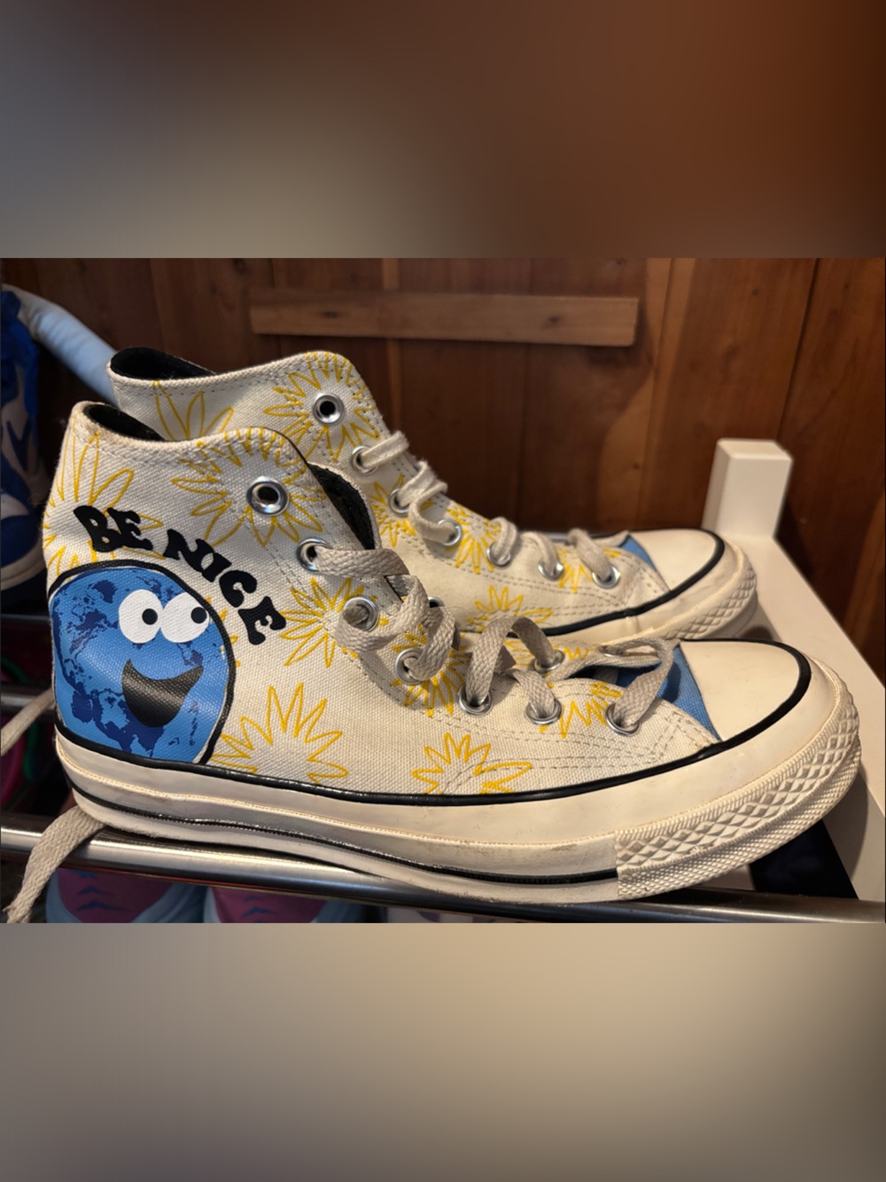 Converse White High-Top Sneakers with Yellow Sunburst and Blue Globe Graphic